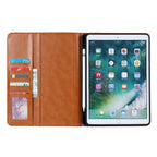 Elevate your iPad 9th Gen (10.2-inch, 2021) with our handcrafted leather folio case. Designed for the modern professional, it combines vintage aesthetics with rugged functionality. Shock resistant, leather wallet with 5 card slots, 2 note slots,1 big pocket, magnetic closure and built-in pencil slot

