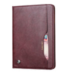 Elevate your iPad Mini 5 (7.9-inch, 2019) with our handcrafted leather folio case. Designed for the modern professional, it combines vintage aesthetics with rugged functionality. Shock resistant, leather wallet with 5 card slots, 2 note slots,1 big pocket, magnetic closure and built-in pencil slot